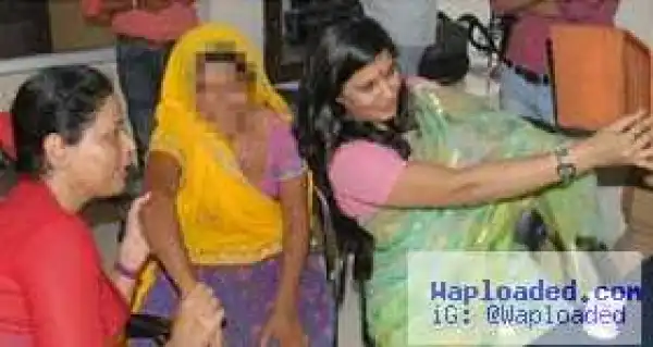 Indian Official Resigns After A Photo Of Her Smiling With A Rape Victim Goes Viral